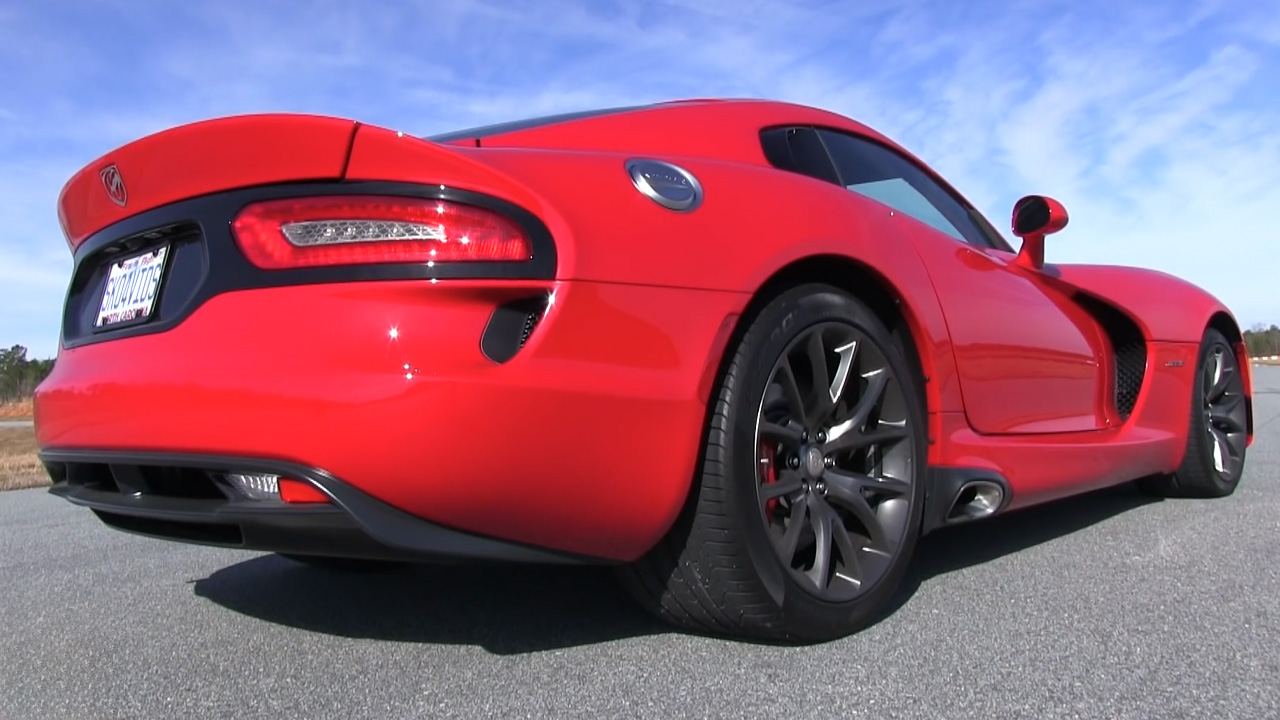Revving high horsepower V10 supercars and loud muscle car exhausts
