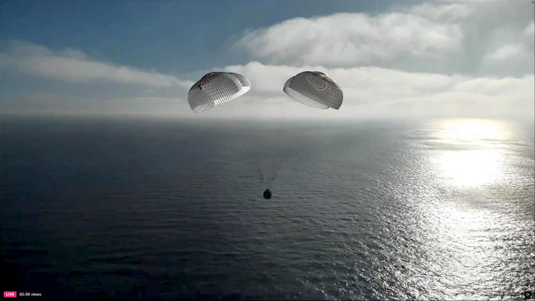 Space station crew returns to Earth with perfect splashdown