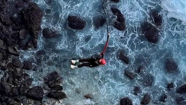 Woman tries terrifying cliff-side bungee jump