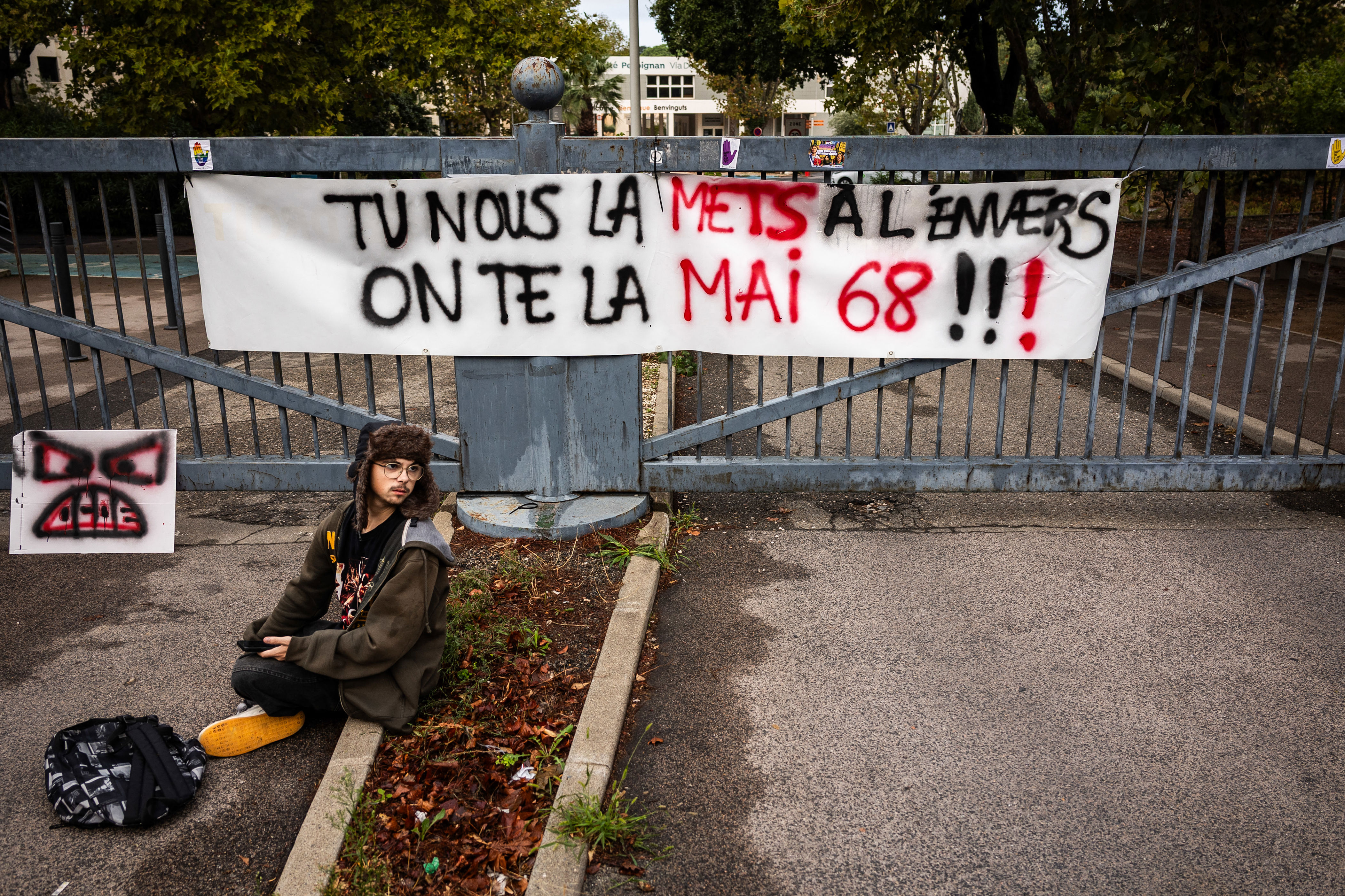 Student protesters in France are holding signs referencing May 1968 ...