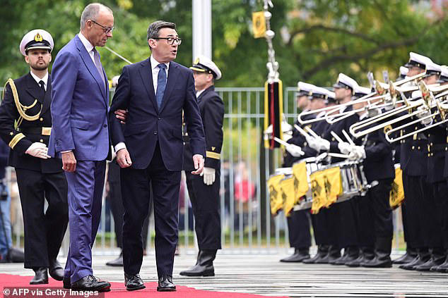 PM holds talks with German chancellor as French minister urges him to ...