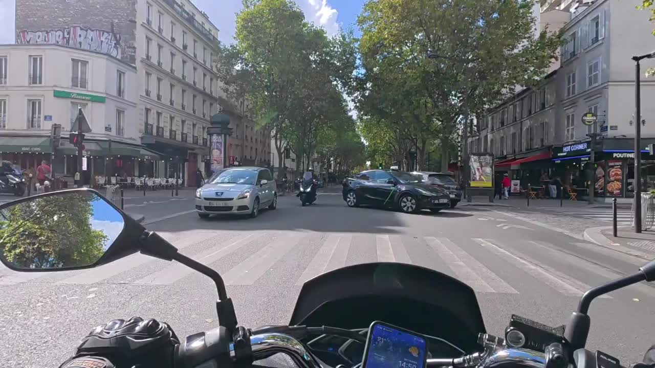 Motorcycle rider crashes into a Porsche Cayenne at an intersection in ...