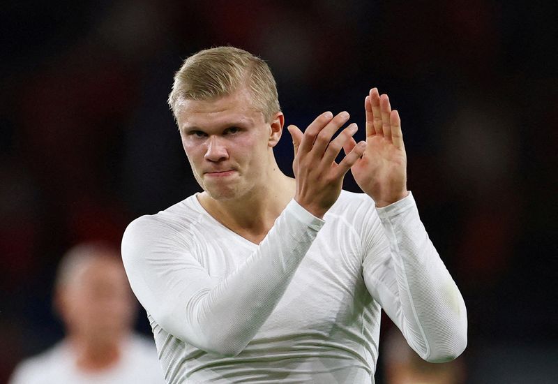 Soccer-Haaland tells embattled Man City fans to stick together