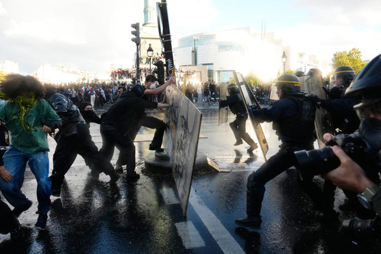 Schoolkids 'storm the Bastille' again as they take over Paris square