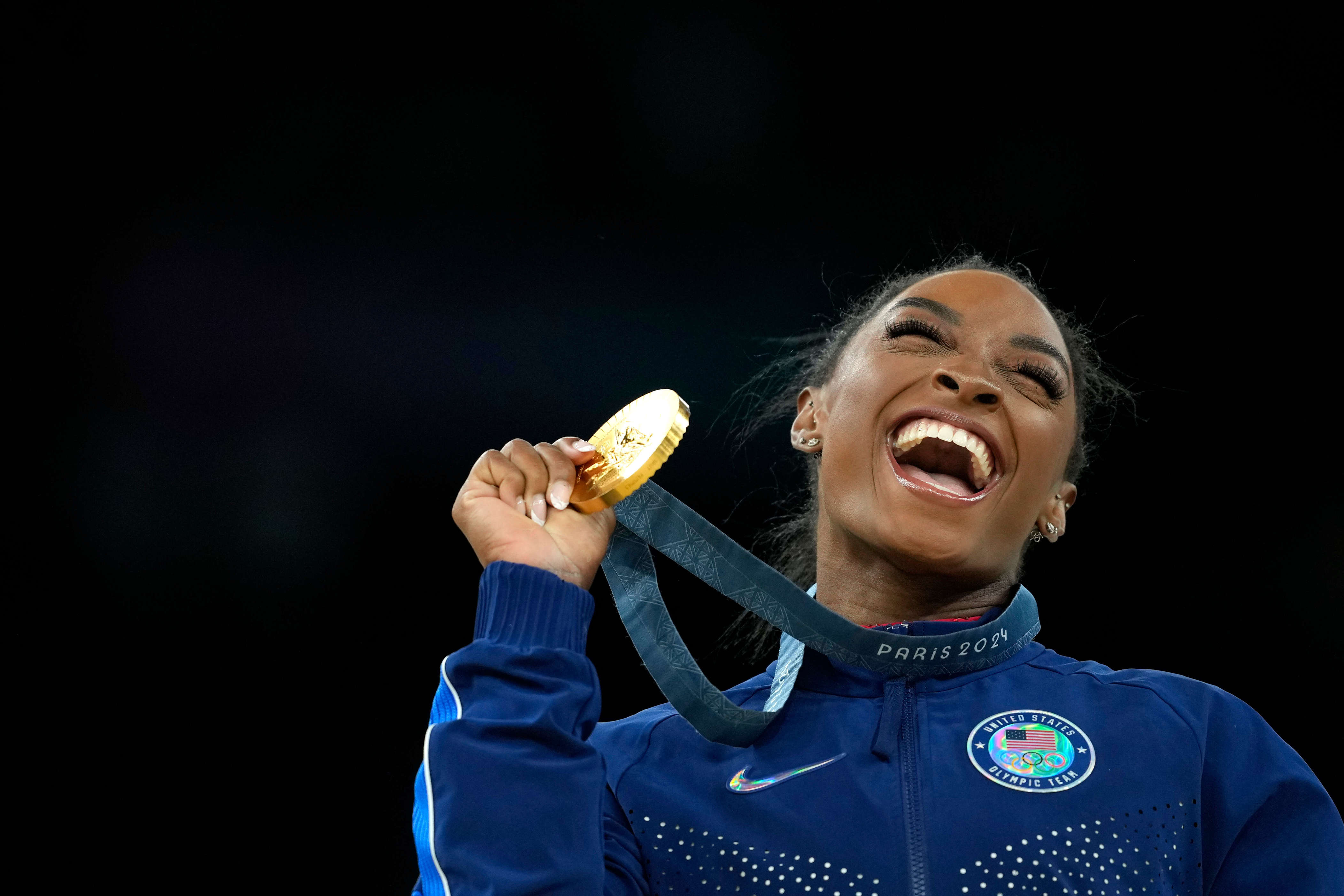 Adoption fueled Biles' rise: Grandparents give gymnast stability ...