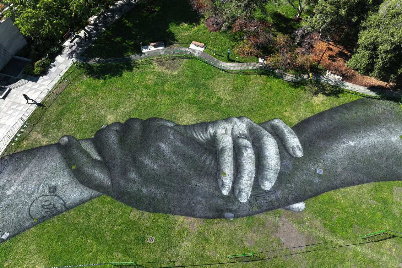 Saype unveils giant 'Beyond Walls' mural at Yerba Buena Gardens