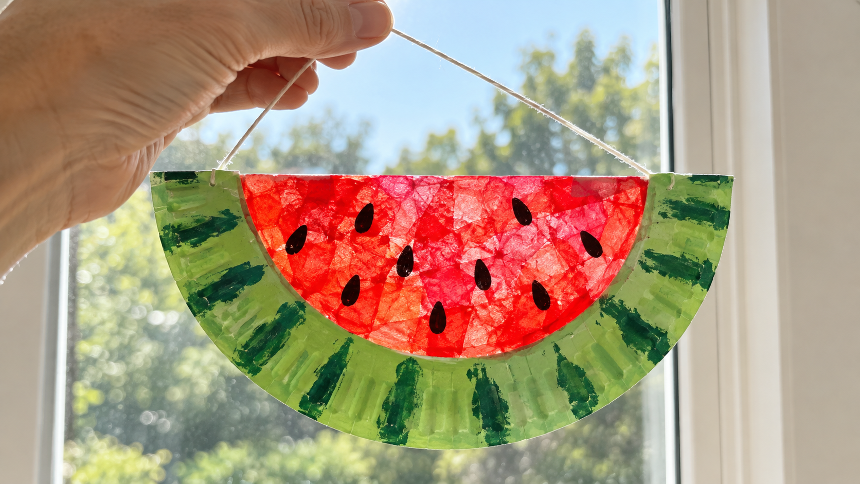 Turn paper plates into colorful watermelon suncatchers