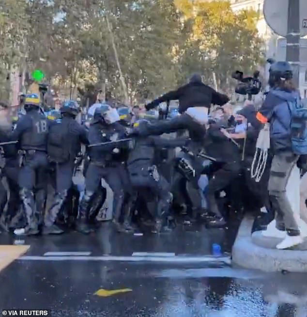 Moment French police clash with students as far-left mayor at forefront ...