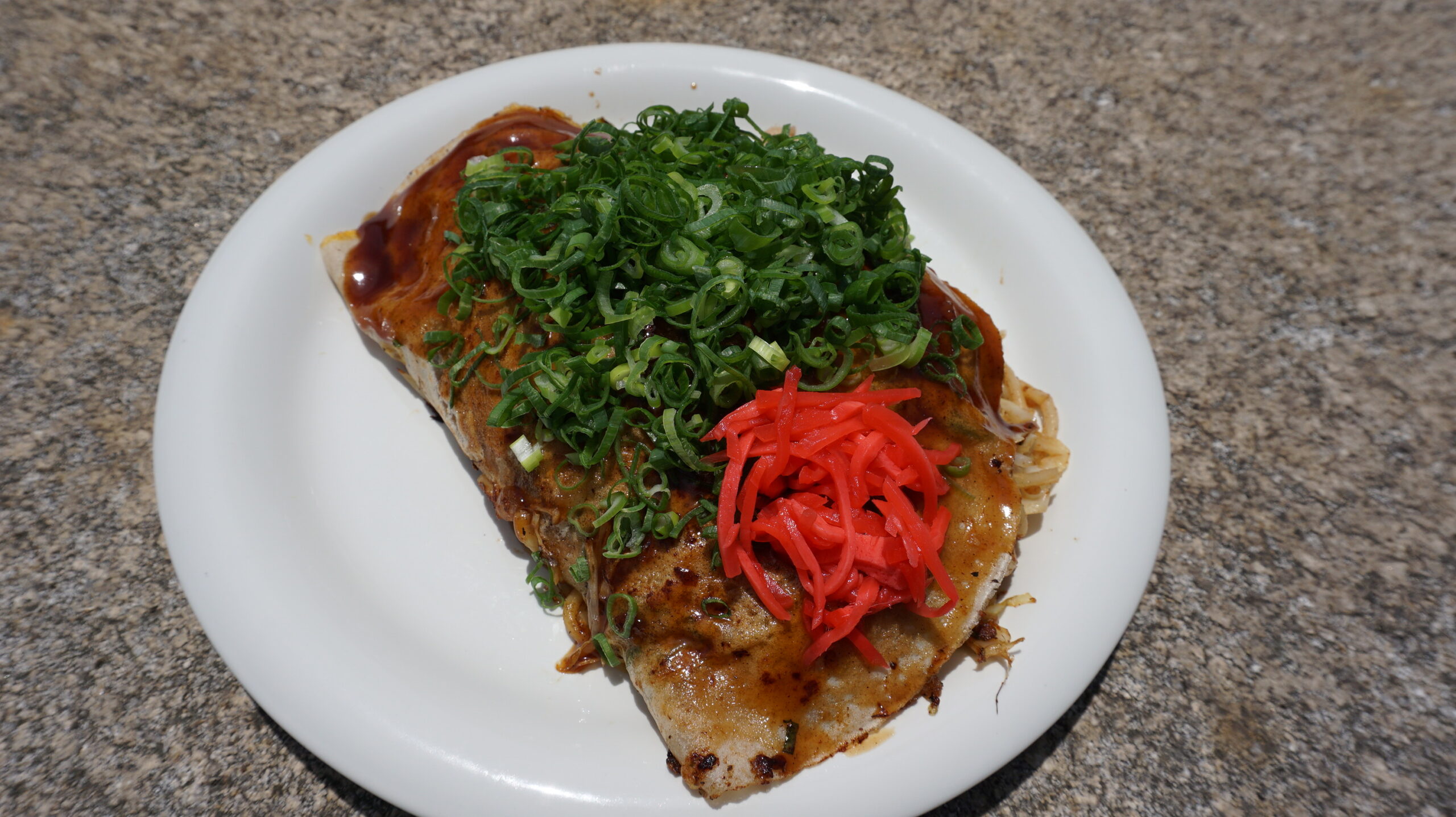 Why is it half-moon shaped? The naval history behind okonomiyaki