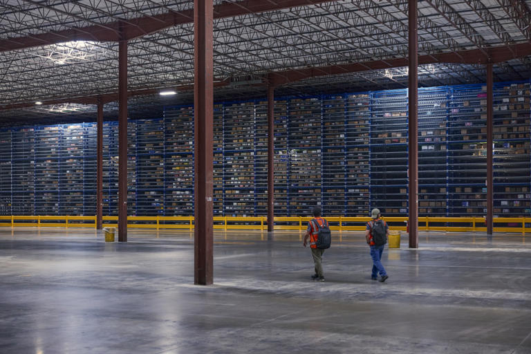 For Walmart, replacing humans with robots is a multibillion-dollar struggle