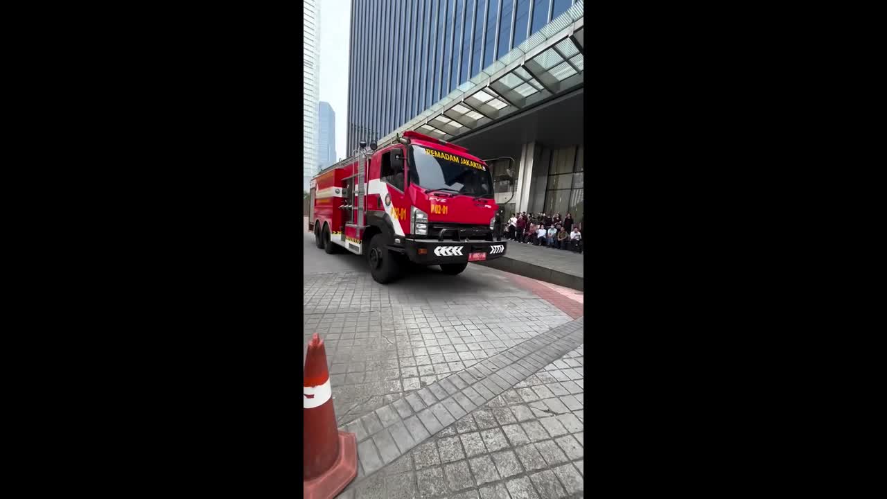 Hundreds of office workers evacuated from Jakarta tower after fire alarm