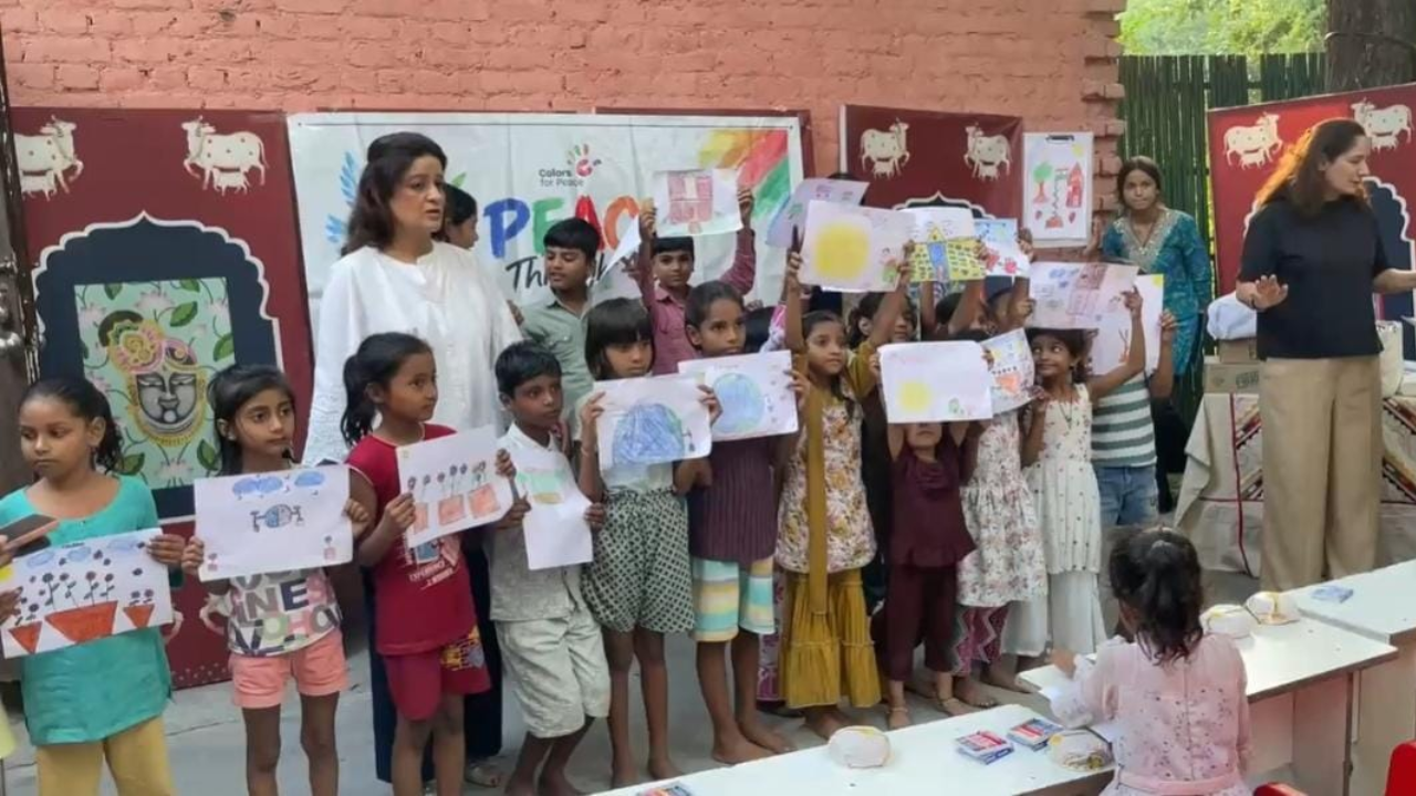 Children paint their own picture of peace