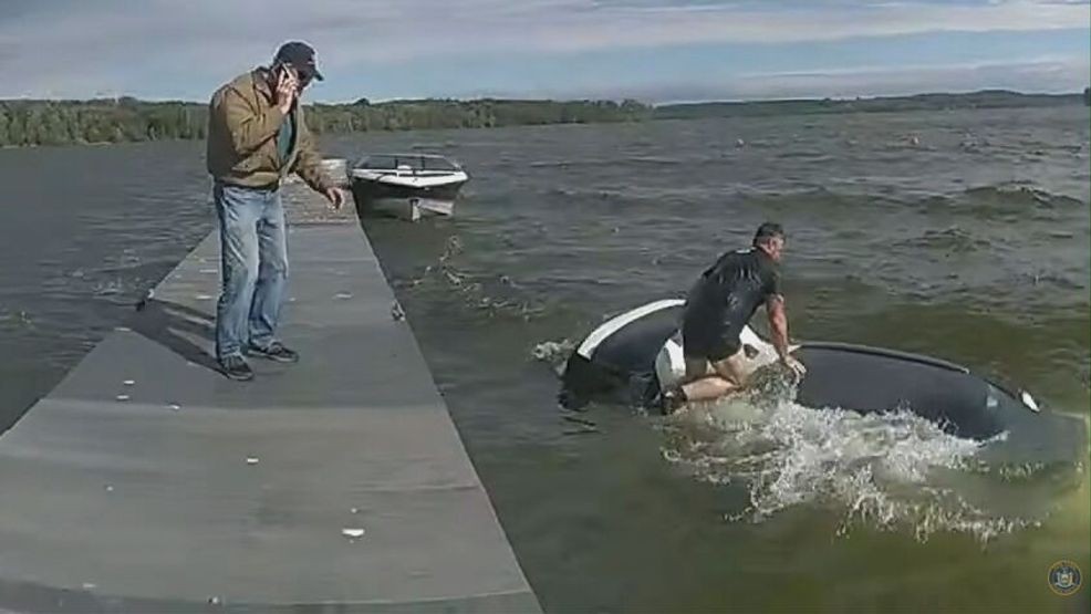 Watch: Trooper, civilian rescue man from sinking car in Cayuga County