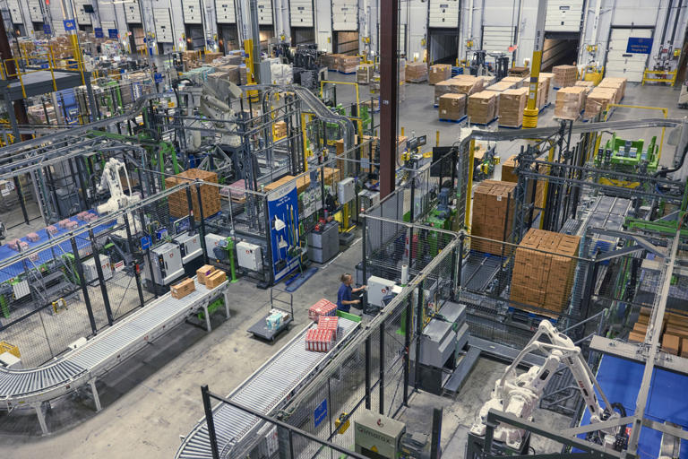 For Walmart, replacing humans with robots is a multibillion-dollar struggle
