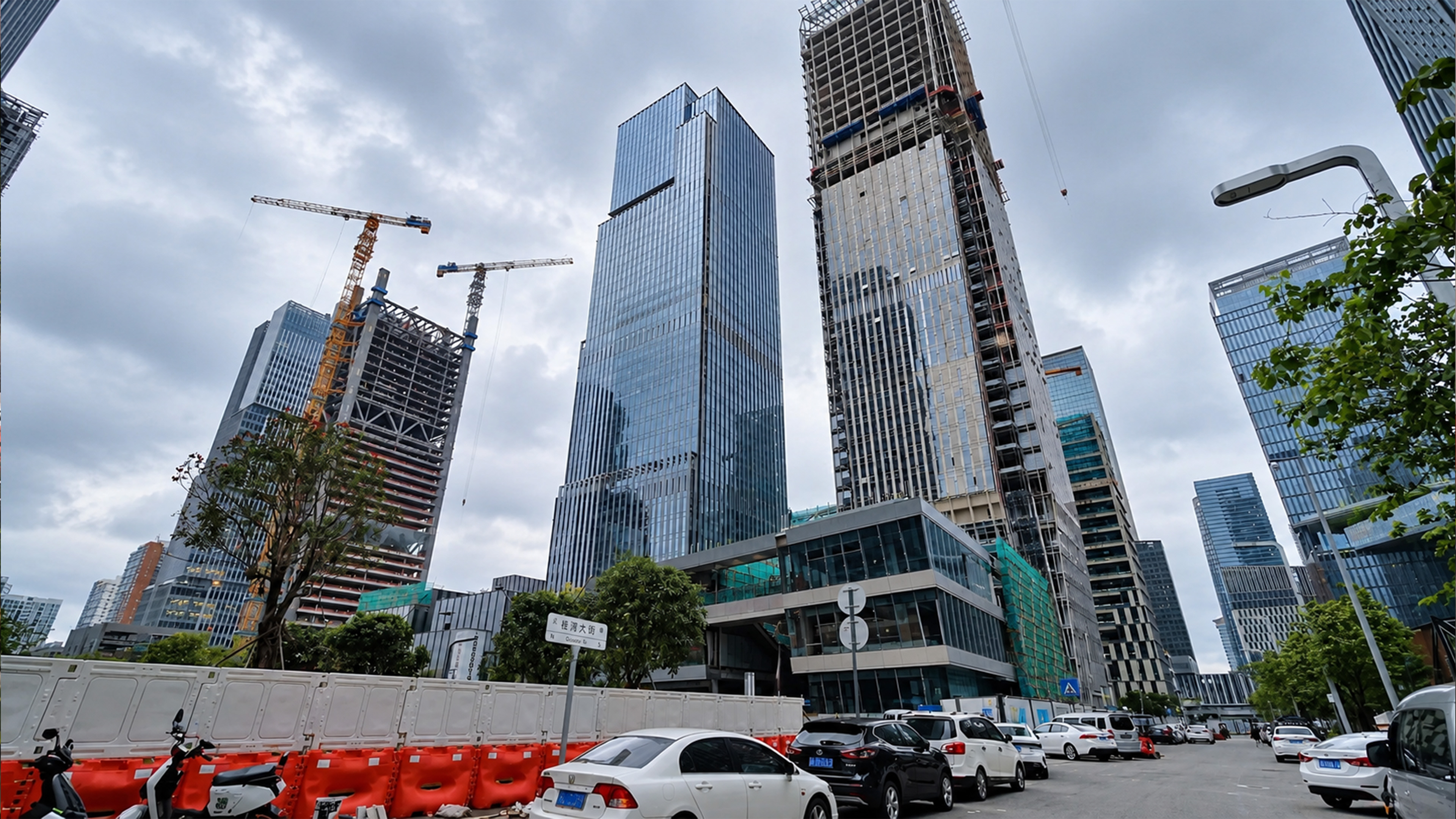 Unfinished towers stand beside completed skyscrapers in China