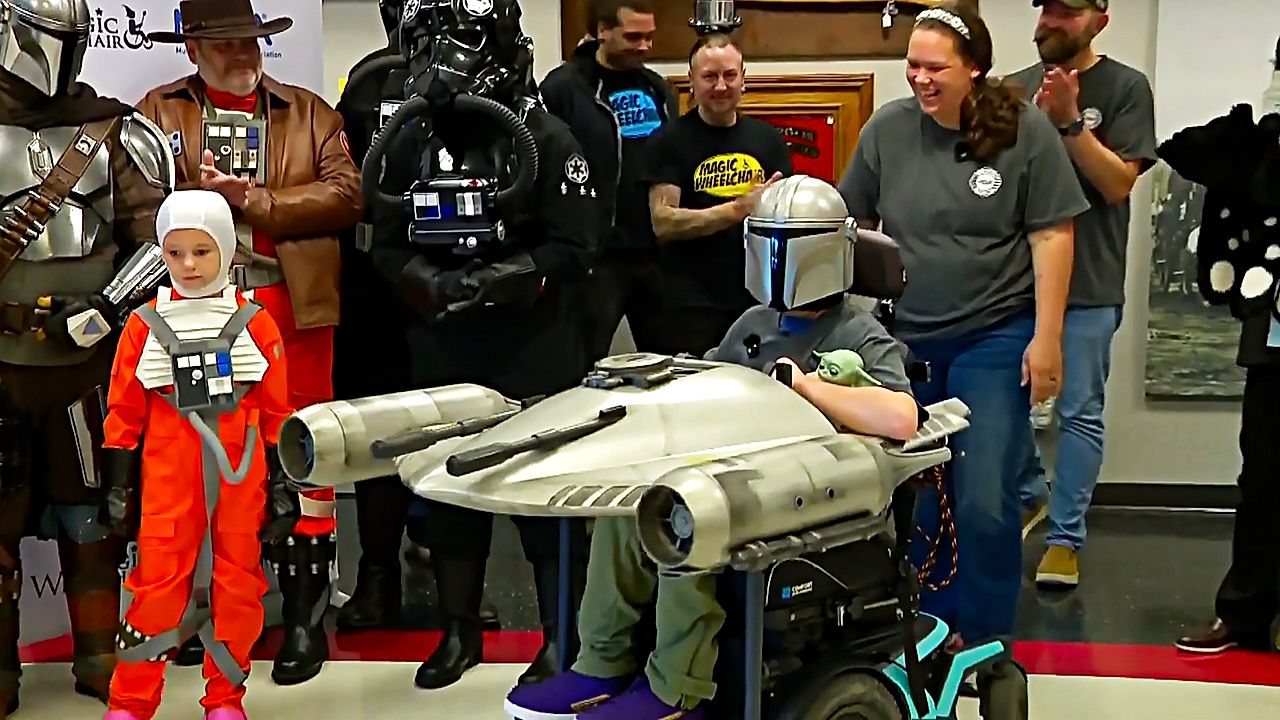 Young Star Wars fan's wheelchair transformed into Mandalorian ...