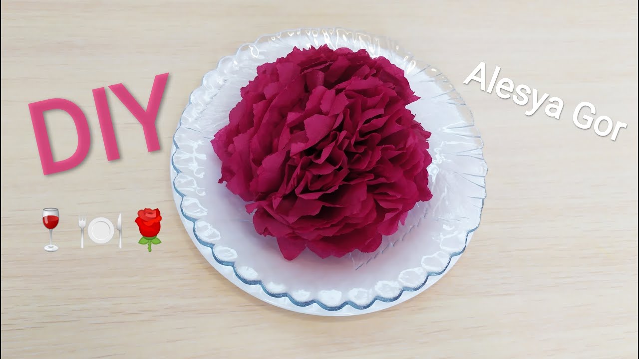 Folding paper napkins into beautiful peony roses