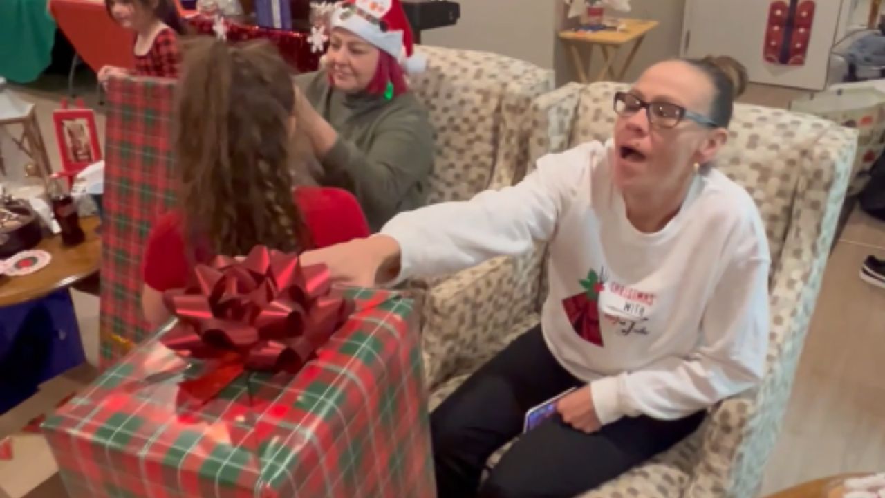 Sisters delightfully surprised with Christmas trees during a ...