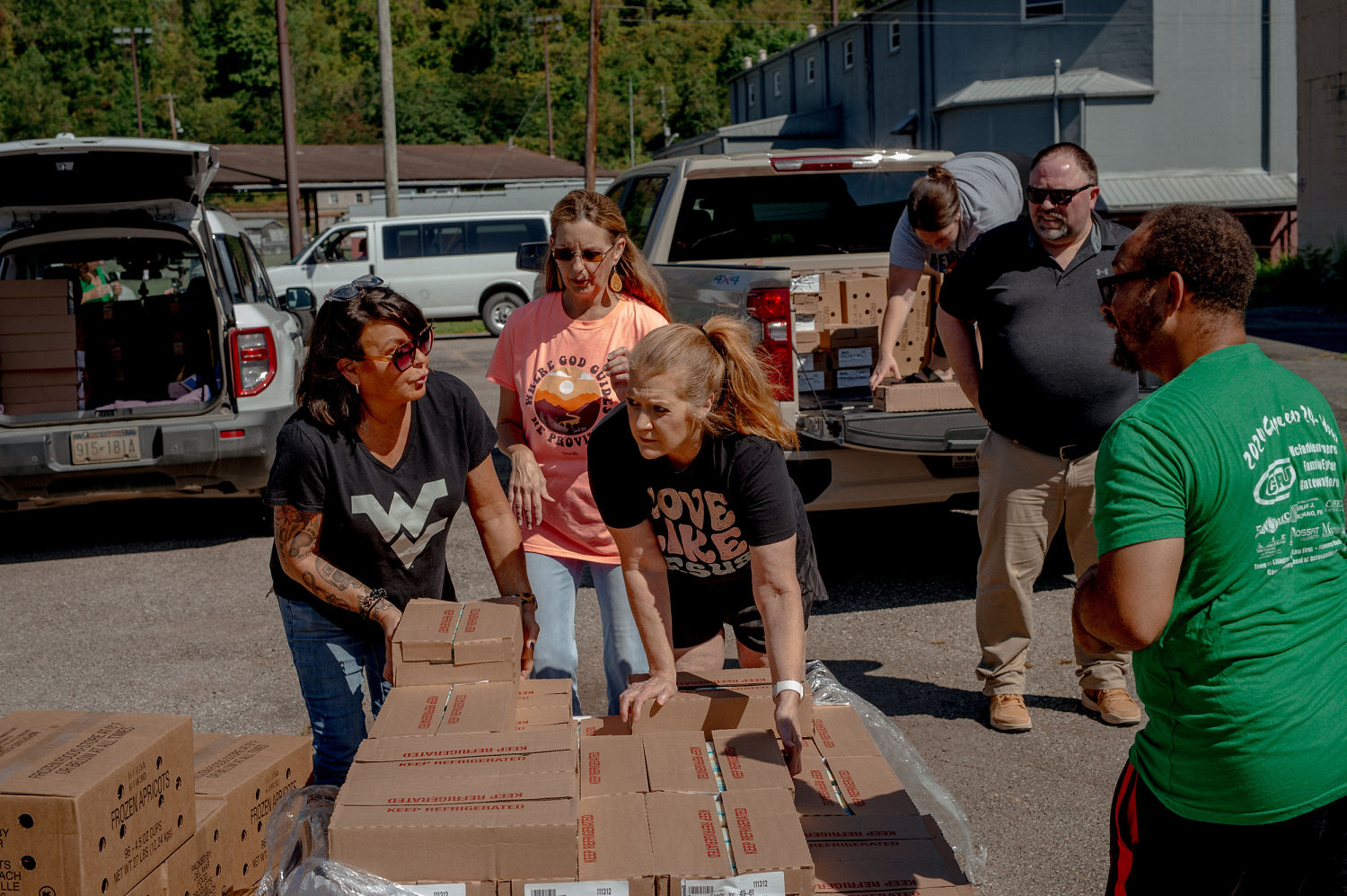 Organizers of several food pantries pick up boxes of food delivered by Facing Hunger Foodbank in Williamson, W.Va. (Mike Belleme for NBC News)