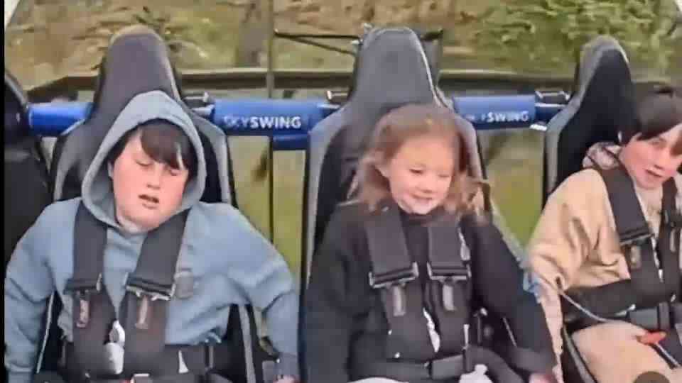 Girl stays calm as sky swing ride malfunctions while boys panic