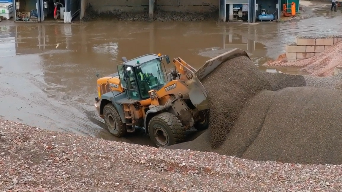 Giant wheel loader tackles massive gravel piles with ease