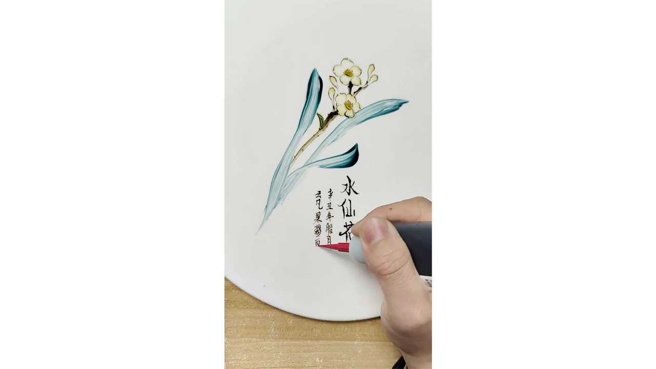 Painting delicate white narcissus flowers with ink creating elegant ...