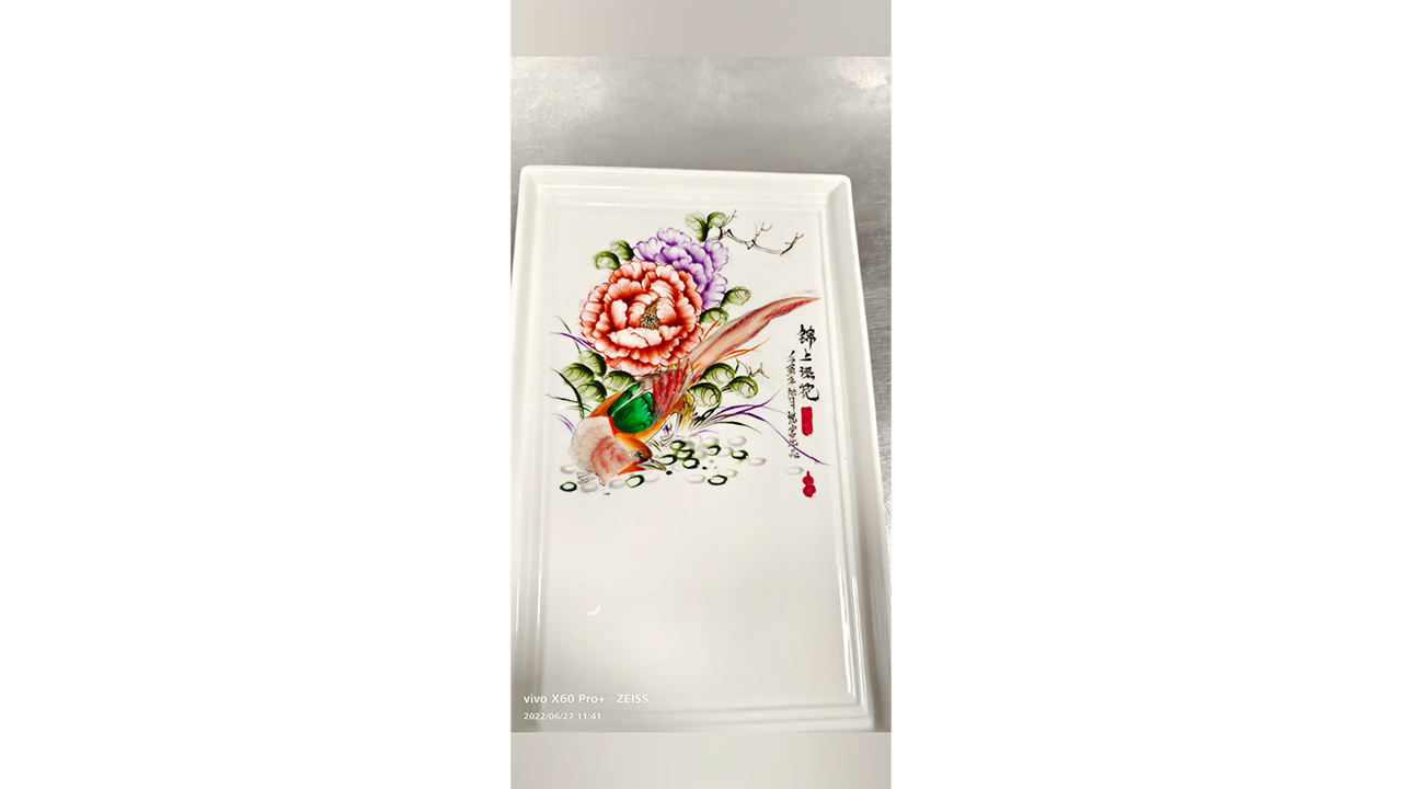 Painting colorful peony flowers and bird with ink creating elegant ...