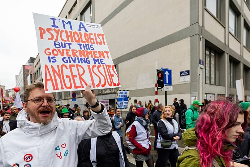 Police and protesters clash in Brussels as anti-austerity rally ...