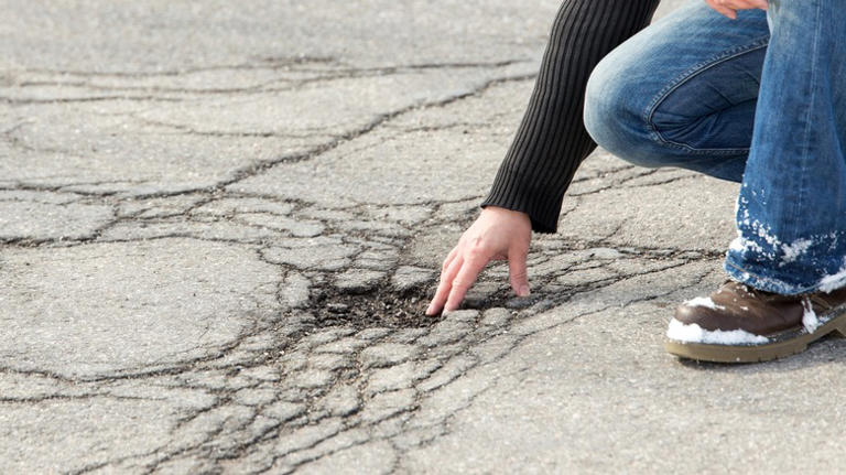 Easily fill potholes in asphalt driveways with a crack-resistant Lowe's ...