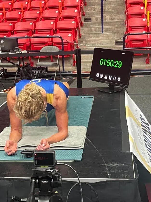 Alberta woman, 61, breaks her own world record by planking for 5 hours
