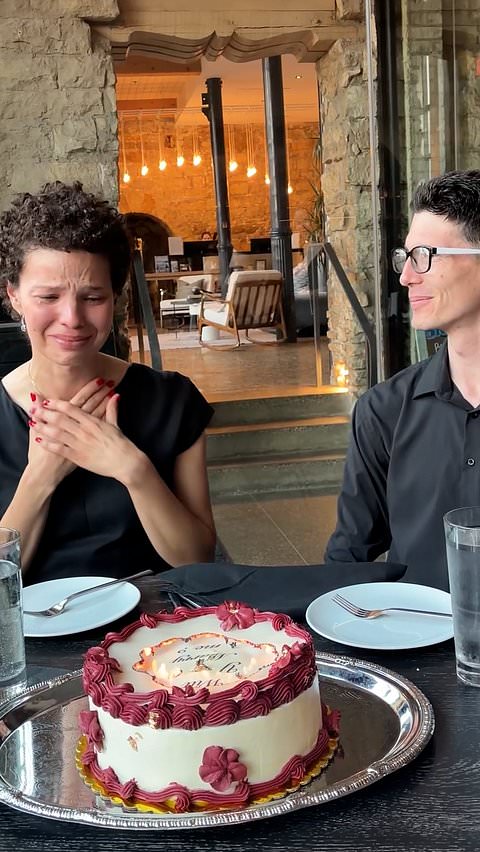 Woman reacts emotionally to burn-away cake marriage proposal