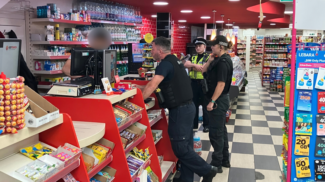 Suspected crime gang cash seized in shop raids