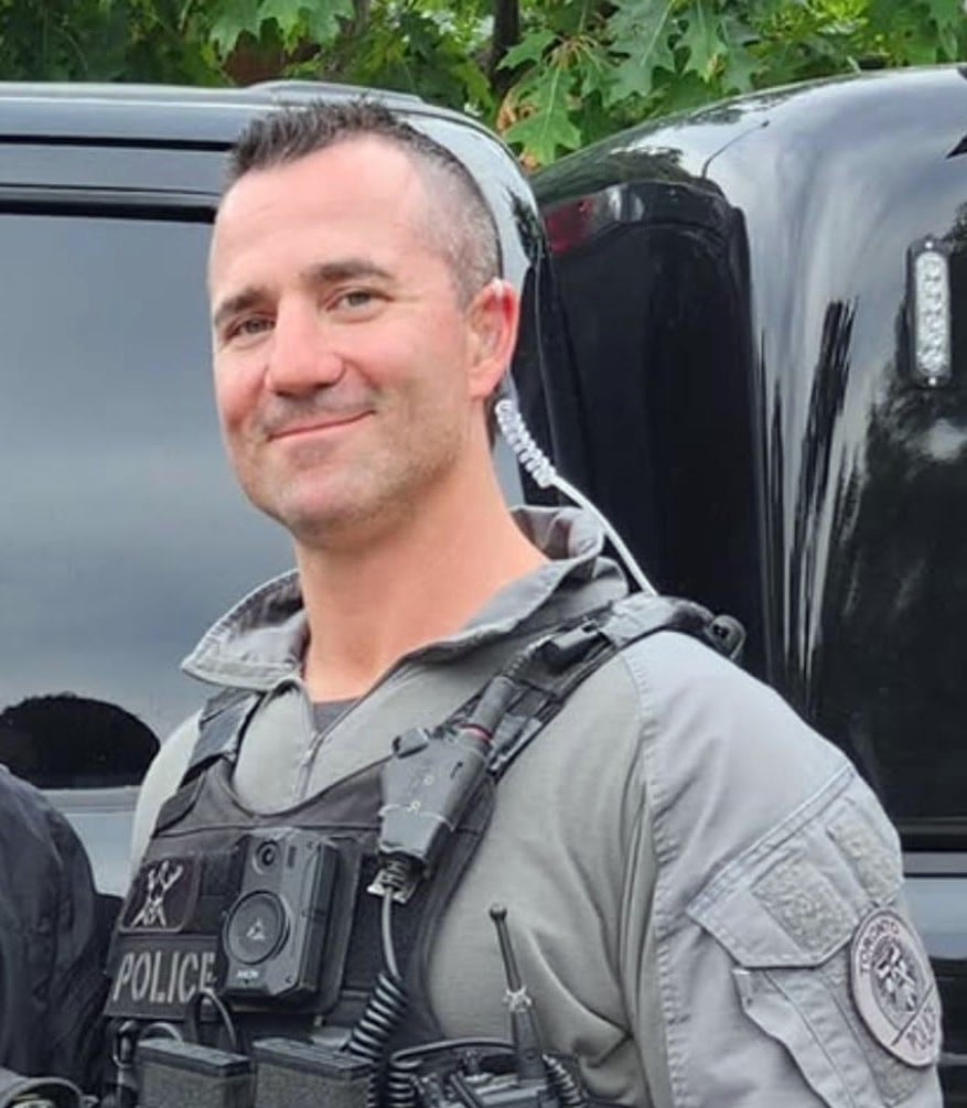 Toronto police officer who shot at man accused in Const. Marc ...