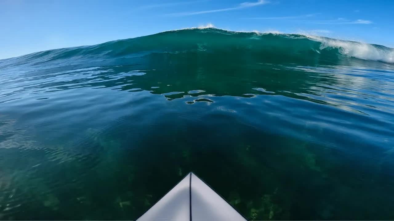 A glassy reef break all to myself — the perfect surf session