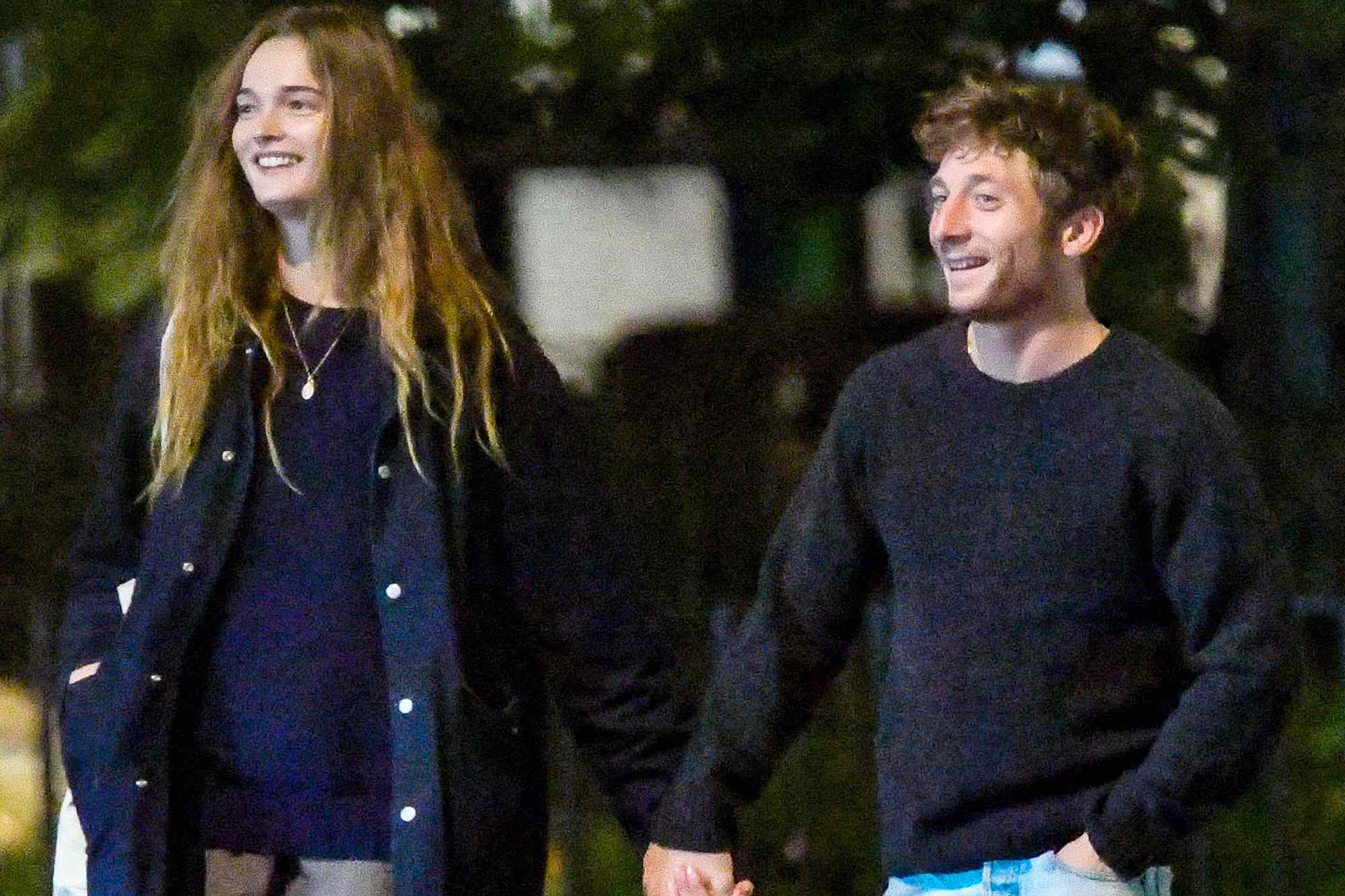 Jeremy Allen White and model Lulu Tenney hold hands during romantic ...