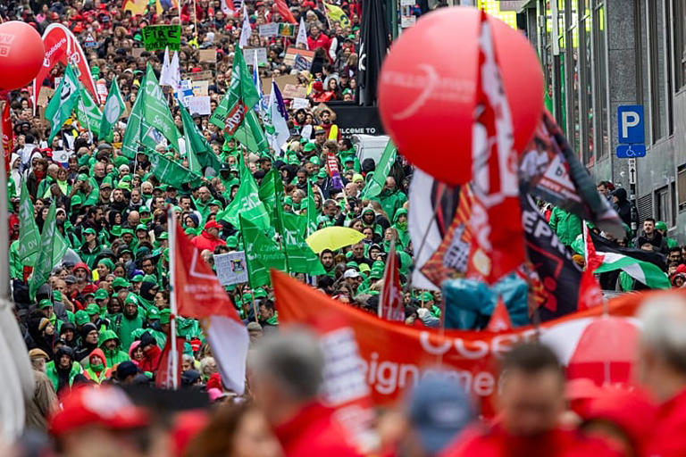 Police and protesters clash in Brussels as anti-austerity rally ...