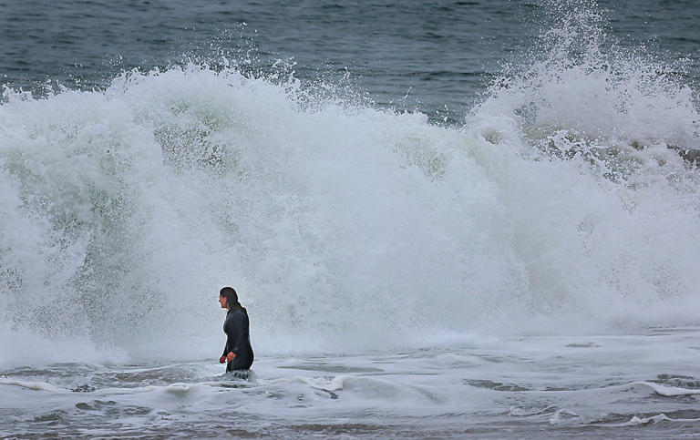 Photo | Waves pound Twin Lakes State Beach in Santa Cruz
