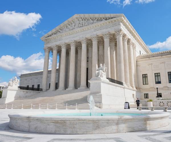 Cities ask Supreme Court to block deportation rule