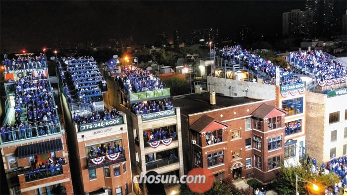Cubs halt unauthorized rooftop viewing at Wrigley