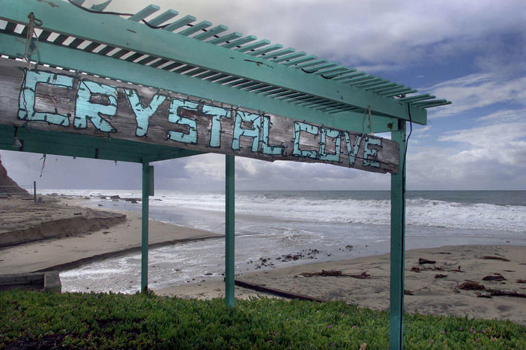 Historic cottages evacuated at Orange County beach over flood risk