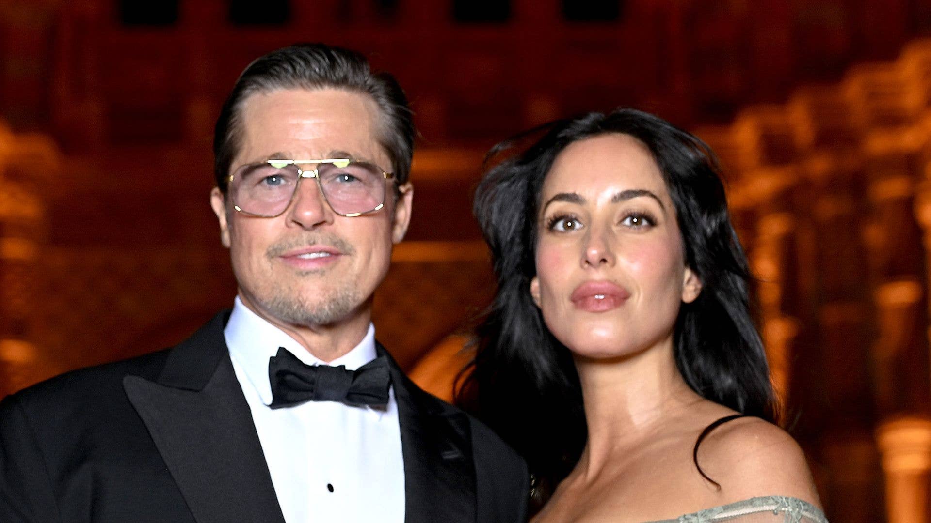 Brad Pitt and Ines de Ramon are picture perfect as they support George ...