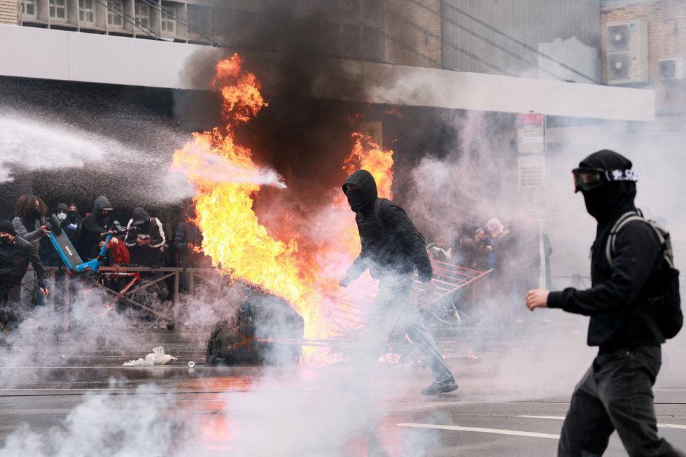 Student riots spread across EU as hundreds clash with Belgian police in ...