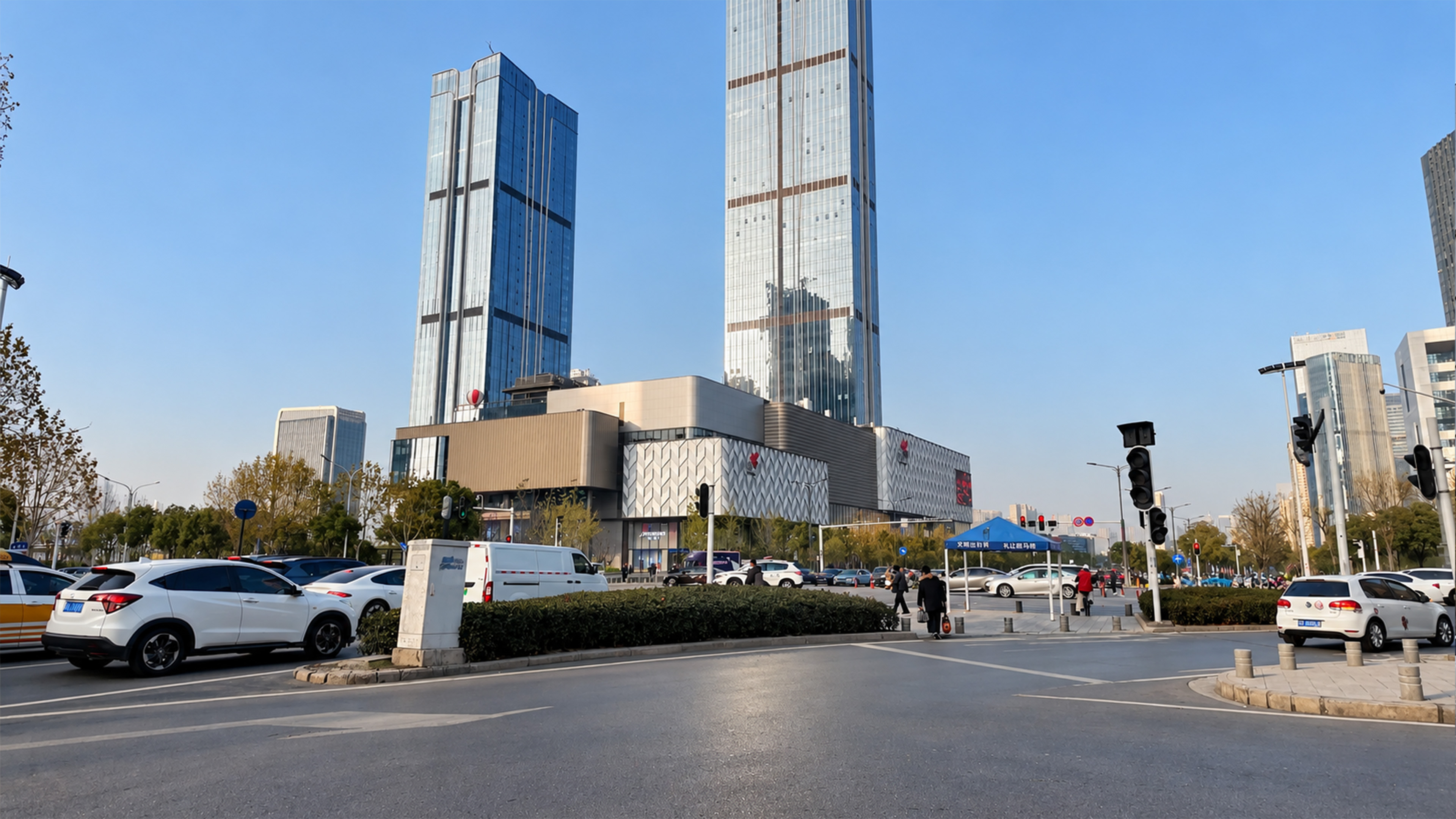 Twin towers rise far above everyday traffic in China
