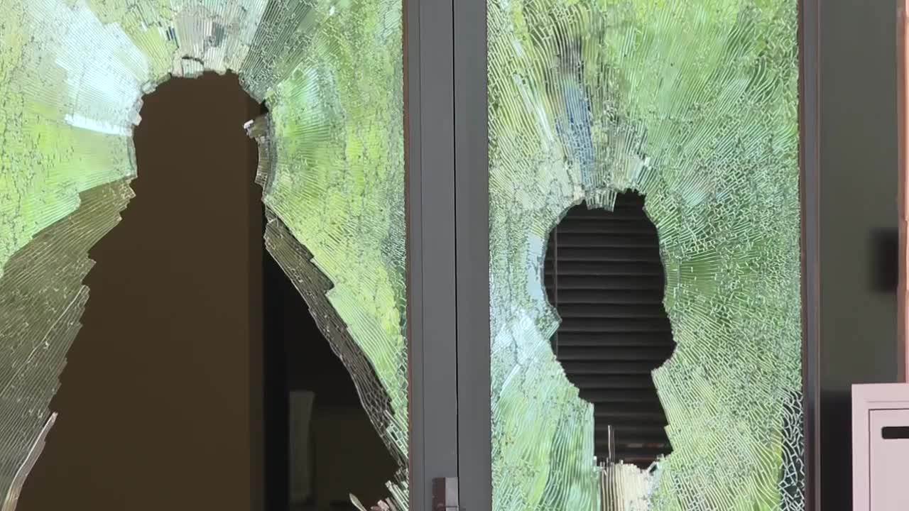 Broken windows, graffiti found at Fisher Industries headquarters in Tempe