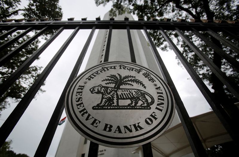 India central bank takes steps to support rupee, opens dollar window ...