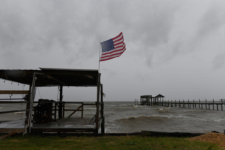 Isaias makes landfall as hurricane, hammering US Gulf Coast with ...