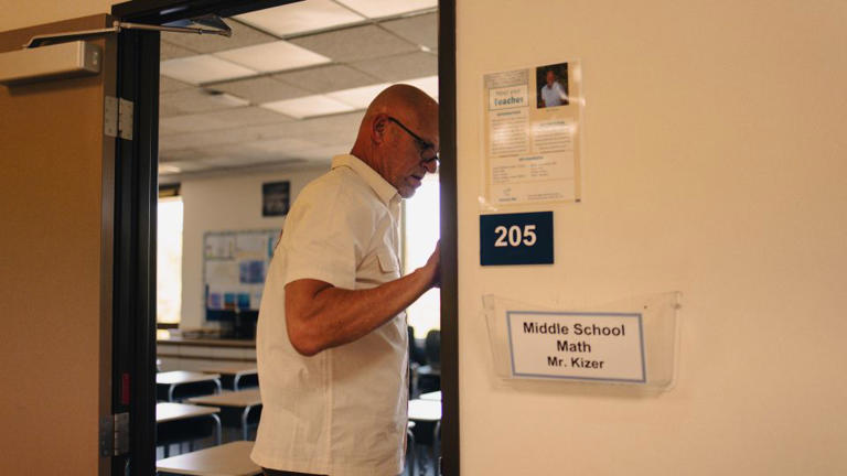 Jeff stops by his classroom. His big concern is if he's on track to save enough for retirement in his 70s. - Maansi Srivastava/CNN