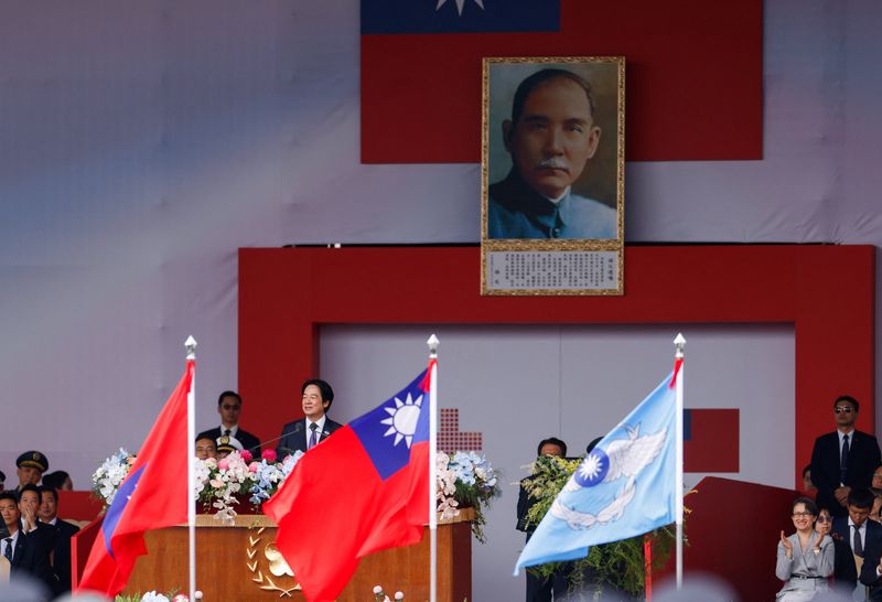Taiwan President Lai Ching-te delivers a speech, next to a portrait of Sun Yat-sen, the founding father of the Republic of China, during National Day celebrations in front of the Presidential Office in Taipei, Taiwan, October 10, 2026. REUTERS/Ann Wang