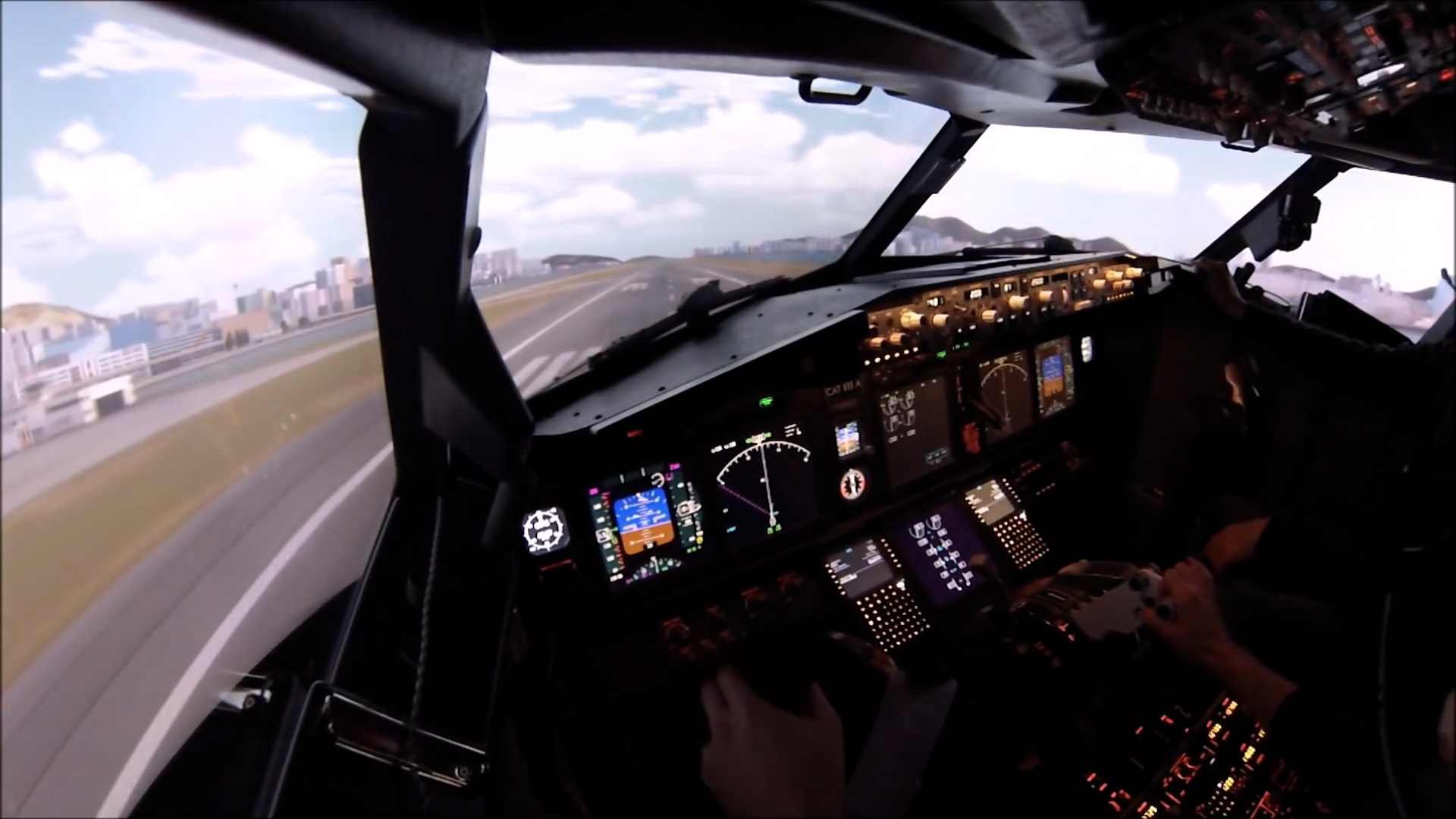 A flight instructor lands a Boeing 737 at Kai Tak in a simulator and ...