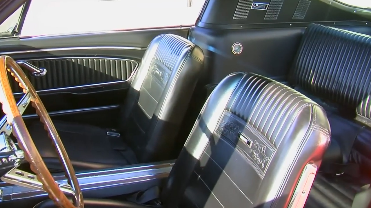 Iconic vintage Ford Mustang featuring deluxe pony interior package
